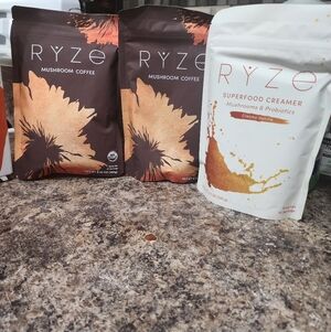 Ryze Superfoods Box with Orange and Brown Design